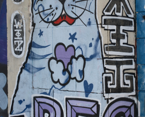 Grafiti von einer Katze über 2 Ecken